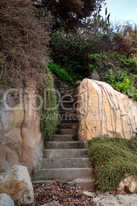 Stone steps leading into an alcove found on a California beach