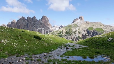 Mountain Creek in the Dolomites and Clouds. Fast Motion