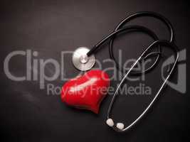 Stethoscope with red heart shape
