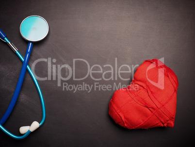 Stethoscope with red heart shape