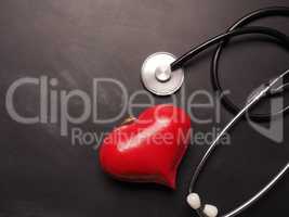 Stethoscope with red heart shape