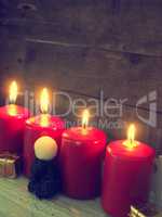 Red Advent candles, retro stylized
