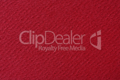 Red paper as a texture or background.
