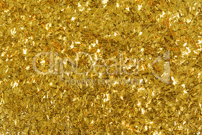 Golden glitter texture, abstract background.
