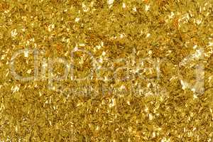 Golden glitter texture, abstract background.