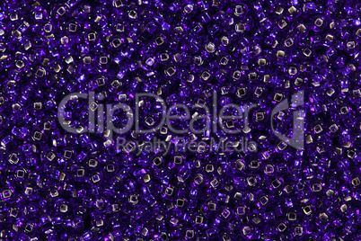 Variety of purple seed beads.