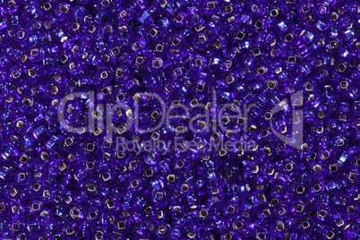 Background of light purple seed beads.