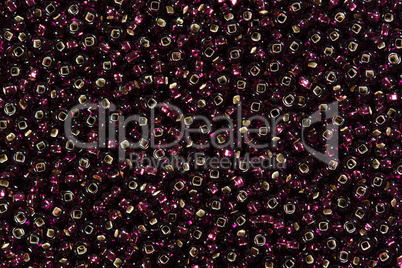 Background of black and red seed beads.