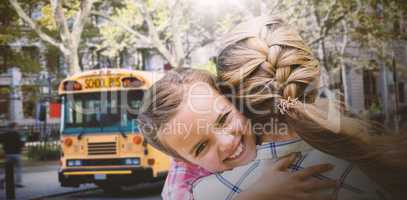 Composite image of mother and daughter hugging