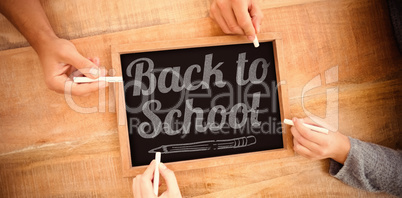 Composite image of back to school text over white background