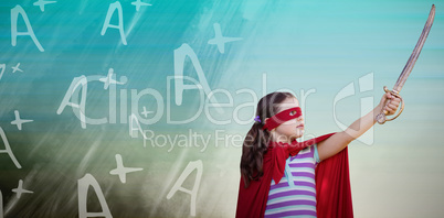 Composite image of girl in superhero costume holding artificial sword
