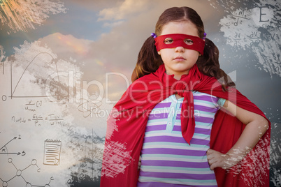 Composite image of portrait of girl in superhero costume
