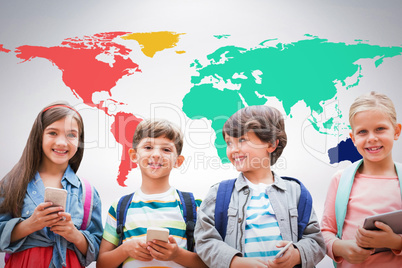 Composite image of portrait of children holding mobile phones