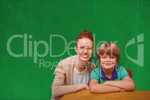 Composite image of happy pupil and teacher