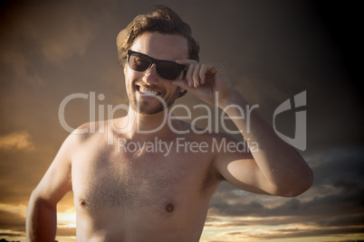 Composite image of handsome men with sunglasses