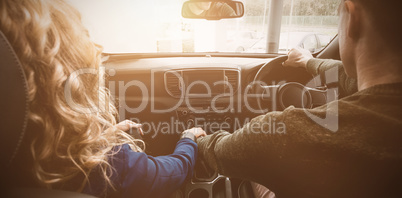 Couple sitting in car during test drive