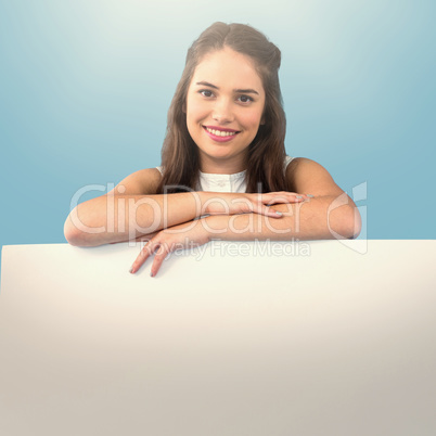 Composite image of women holding blank poster