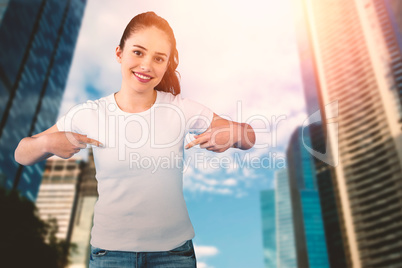 Composite image of portrait of smiling brunette woman in front of white background