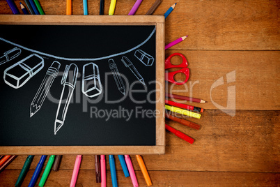 Composite image of graphic image of school supplies arranged