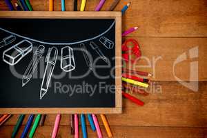 Composite image of graphic image of school supplies arranged