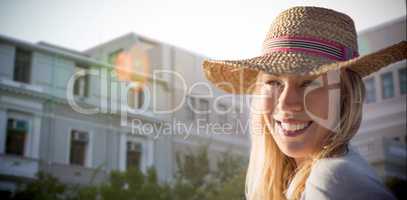 Composite image of portrait of beautiful blonde women wearing hat