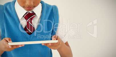 Schoolboy using digital tablet