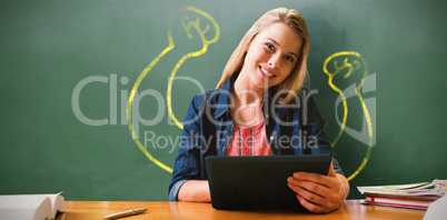 Composite image of student studying in the library with tablet