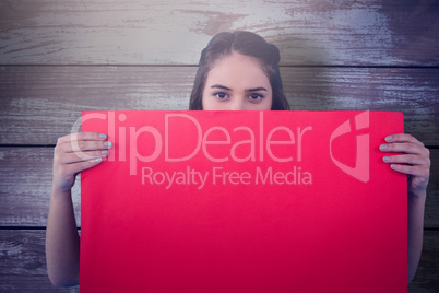 Composite image of women holding blank poster red