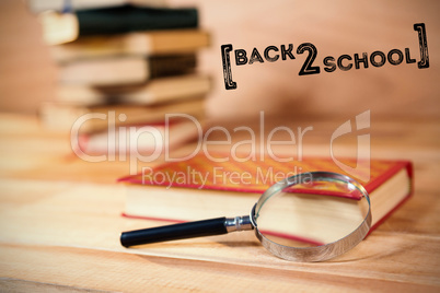 Composite image of back to school text over white background