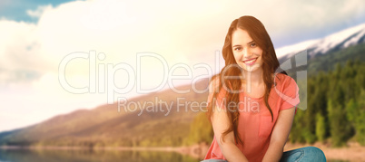 Composite image of happy women thinking on the floor