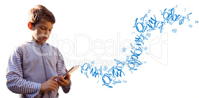 Composite image of boy using digital tablet