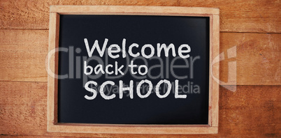 Composite image of welcome back to school text against white background