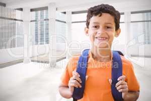 Composite image of portrait of smiling boy