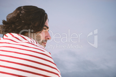 Composite image of profile view of handsome man