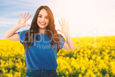 Composite image of portrait of happy female fashion model gesturing