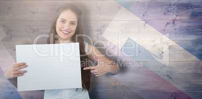 Composite image of women holding blank poster