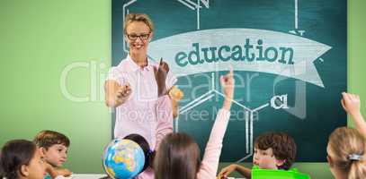 Composite image of students raising hands while teacher teaching