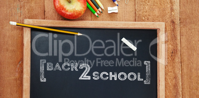 Composite image of back to school text over white background