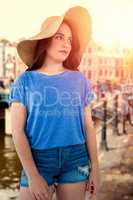 Composite image of brunette women wearing summer hat