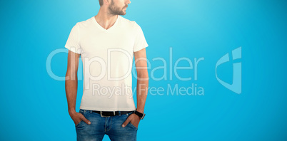 Composite image of male model with hands in pockets looking away