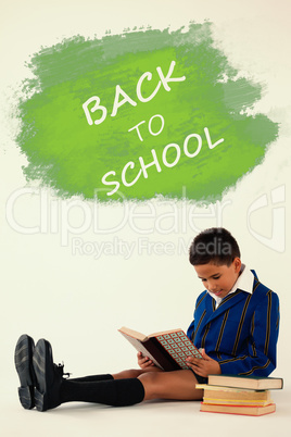 Composite image of digital composite image of back to school text on blue spray paint