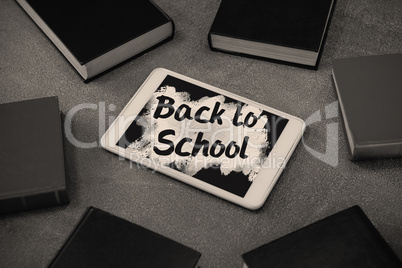 Composite image of back to school text on pink splash
