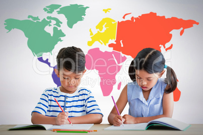 Composite image of children writing on books at table