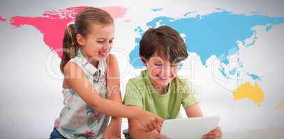 Composite image of boy with sister using digital tablet