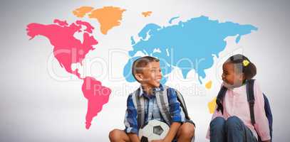 Composite image of boy with friend holding soccer ball