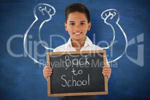 Composite image of schoolboy holding slate with text over white background