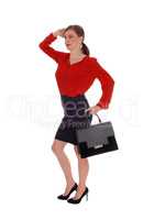 Business woman walking with black purse