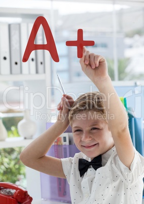Happy office kid boy pointing at an A+ text