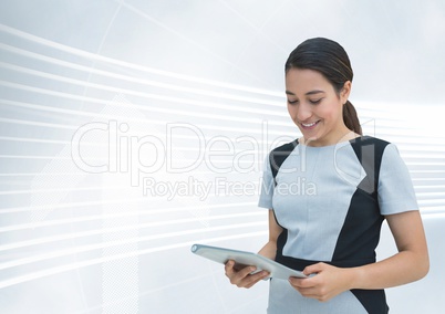 Happy business woman looking at a tablet against white and blue background