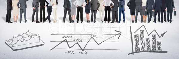 Group of business people standing in front of statistics performance charts drawings